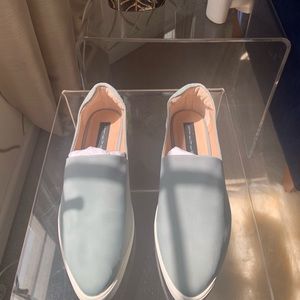 Size 9 Steven Madden Slip Ons.